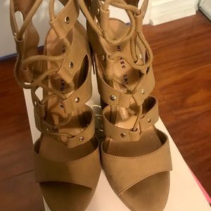 Tan strap up sandals